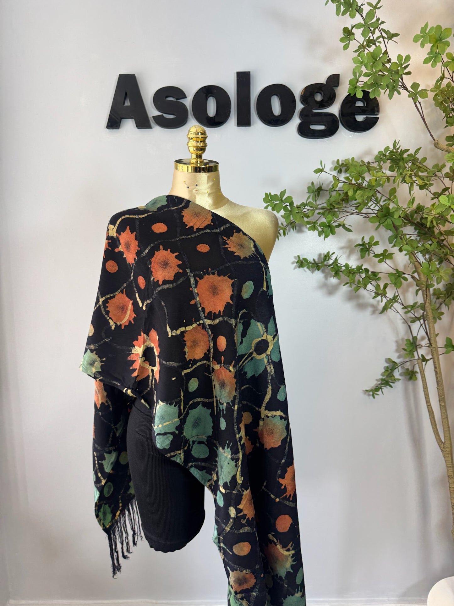 Colorful-patterned hand-dyed Adire shawl  by Asologe